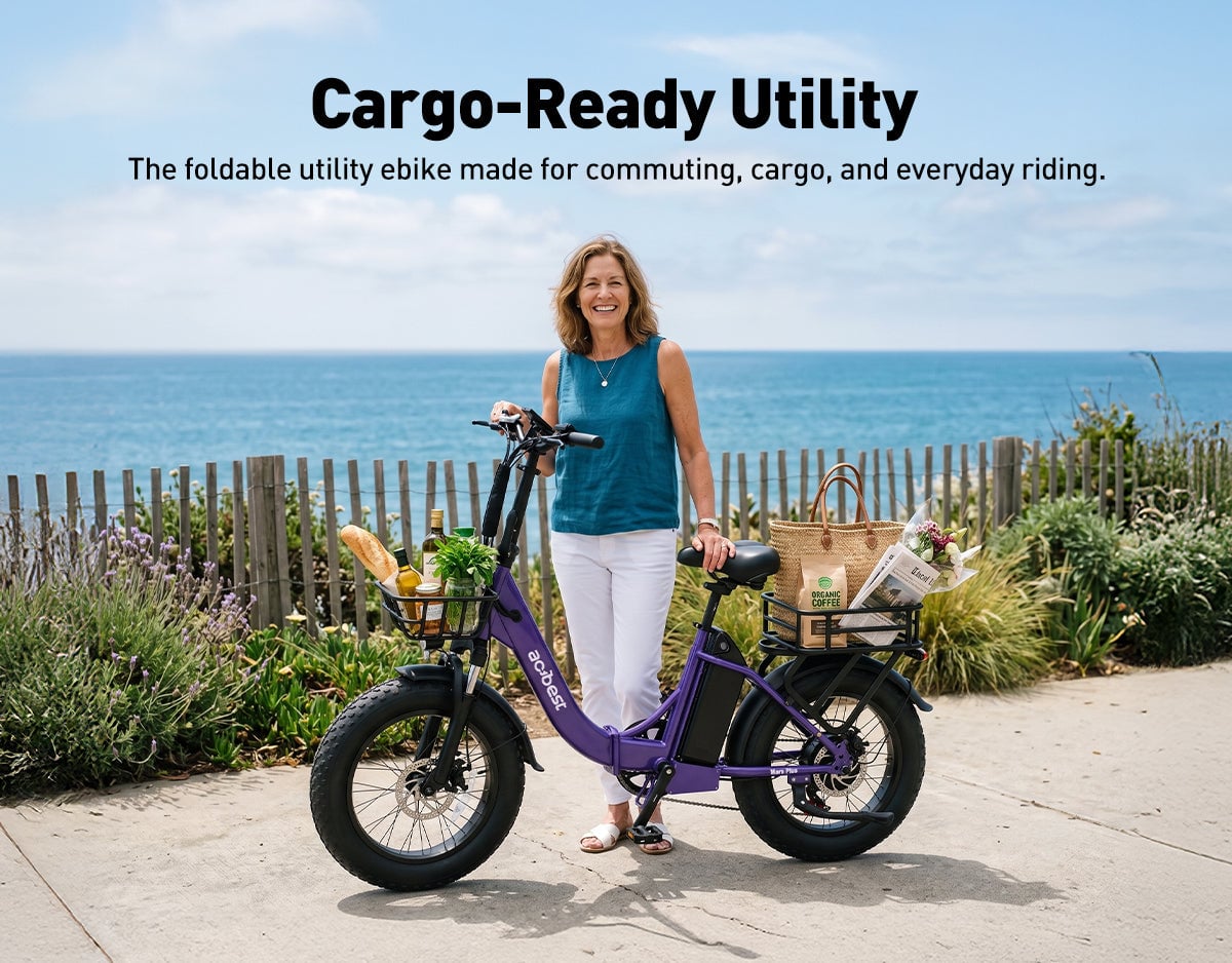 Woman with groceries and basket posing with purple foldable utility ebike by the ocean