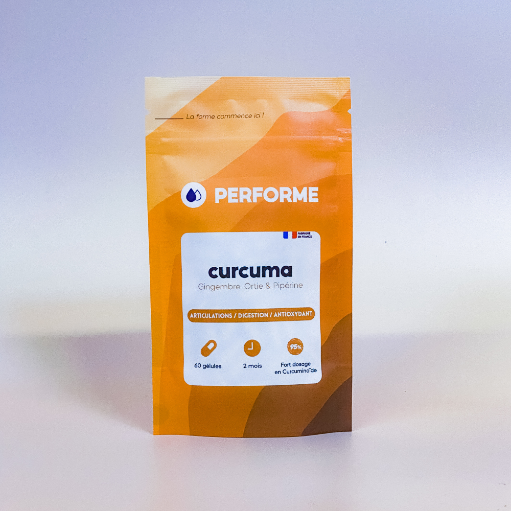 Sachet dégradé orange contenant des gélules de curcuma avec logos et texte d'informations produit